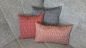 Preview: Dekokissen Bras rot-beige und blau auf Couch